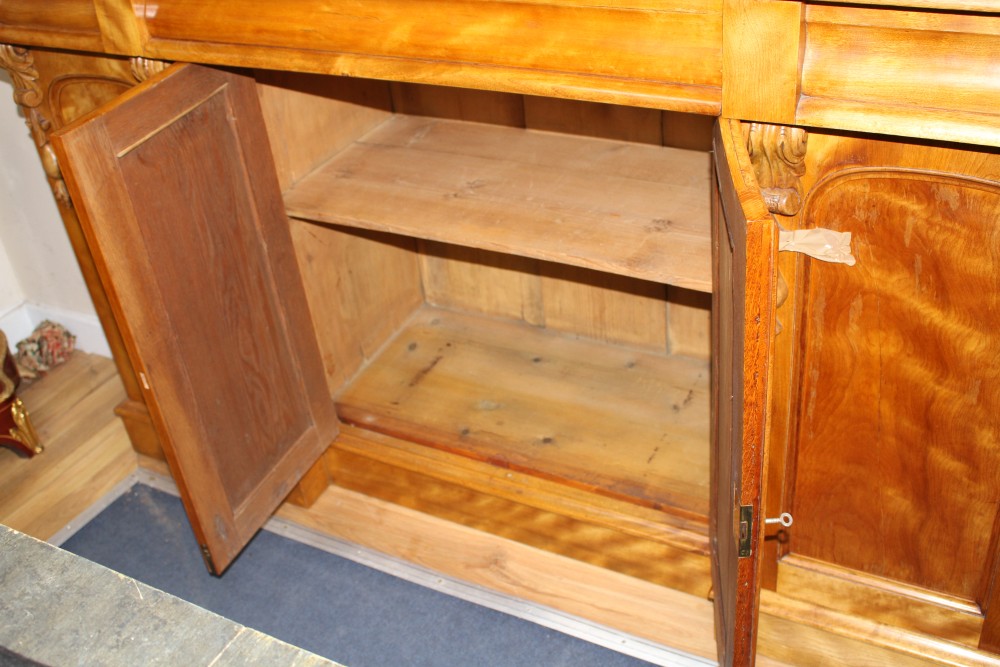 A Victorian satin birch breakfront and inverse breakfront library bookcase, W.170cm D.59cm H.257cm